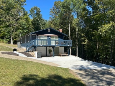 Welcome to this serene 3-bedroom, 2-bathroom residence located on Lake Mohawk Golf Club in Ohio - for sale on GolfHomes.com, golf home, golf lot