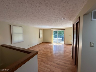Welcome to this serene 3-bedroom, 2-bathroom residence located on Lake Mohawk Golf Club in Ohio - for sale on GolfHomes.com, golf home, golf lot