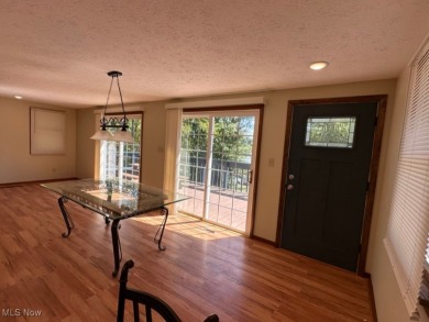 Welcome to this serene 3-bedroom, 2-bathroom residence located on Lake Mohawk Golf Club in Ohio - for sale on GolfHomes.com, golf home, golf lot