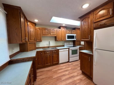 Welcome to this serene 3-bedroom, 2-bathroom residence located on Lake Mohawk Golf Club in Ohio - for sale on GolfHomes.com, golf home, golf lot