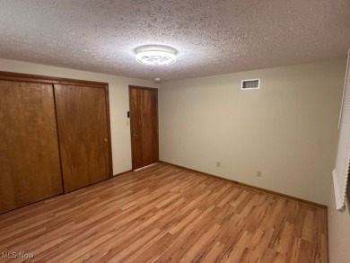 Welcome to this serene 3-bedroom, 2-bathroom residence located on Lake Mohawk Golf Club in Ohio - for sale on GolfHomes.com, golf home, golf lot