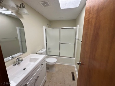 Welcome to this serene 3-bedroom, 2-bathroom residence located on Lake Mohawk Golf Club in Ohio - for sale on GolfHomes.com, golf home, golf lot