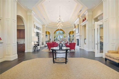 Experience the pinnacle of lakefront living in the heart of on Sarasota National Golf Club in Florida - for sale on GolfHomes.com, golf home, golf lot