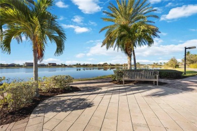 Experience the pinnacle of lakefront living in the heart of on Sarasota National Golf Club in Florida - for sale on GolfHomes.com, golf home, golf lot