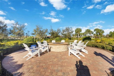 Experience the pinnacle of lakefront living in the heart of on Sarasota National Golf Club in Florida - for sale on GolfHomes.com, golf home, golf lot