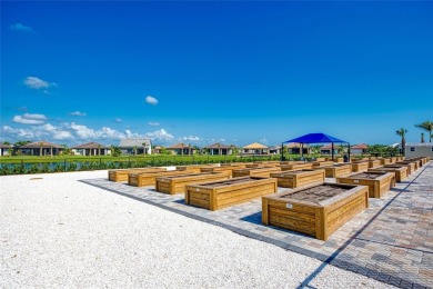 Experience the pinnacle of lakefront living in the heart of on Sarasota National Golf Club in Florida - for sale on GolfHomes.com, golf home, golf lot