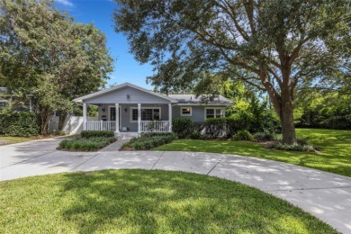 Welcome to the heart of Lakeland! Just steps from Lake on Cleveland Heights Golf Course in Florida - for sale on GolfHomes.com, golf home, golf lot