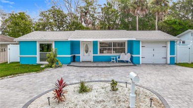 Live the Florida lifestyle in the highly sought-after waterfront on Gulf Harbors Golf Course in Florida - for sale on GolfHomes.com, golf home, golf lot