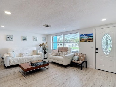 Live the Florida lifestyle in the highly sought-after waterfront on Gulf Harbors Golf Course in Florida - for sale on GolfHomes.com, golf home, golf lot