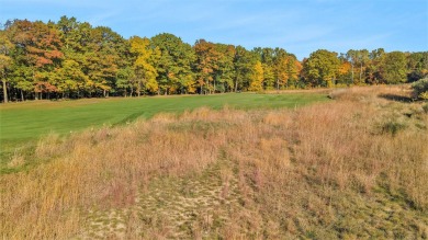 The Estates at Pine Glen is an exclusive residential development on Ravines Golf Club in Michigan - for sale on GolfHomes.com, golf home, golf lot