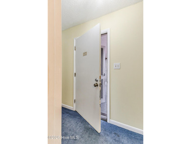 Affordable first-floor condo in the heart of Calabash -- proudly on Carolina Shores Golf Course in North Carolina - for sale on GolfHomes.com, golf home, golf lot