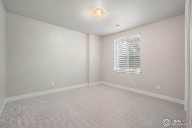 Welcome to this beautiful 3-bedroom, 3.5-bath end-unit townhome on Highland Meadows Golf Course in Colorado - for sale on GolfHomes.com, golf home, golf lot