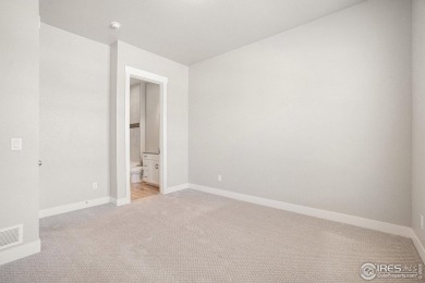 Welcome to this beautiful 3-bedroom, 3.5-bath end-unit townhome on Highland Meadows Golf Course in Colorado - for sale on GolfHomes.com, golf home, golf lot
