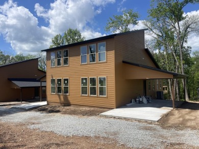 This newly constructed 2,470 sq ft unit features 2 spacious on Shangri La Golf Resort and Club in Oklahoma - for sale on GolfHomes.com, golf home, golf lot