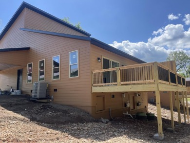 This newly constructed 2,470 sq ft unit features 2 spacious on Shangri La Golf Resort and Club in Oklahoma - for sale on GolfHomes.com, golf home, golf lot