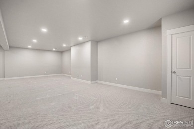 Welcome to this beautiful 3-bedroom, 3.5-bath end-unit townhome on Highland Meadows Golf Course in Colorado - for sale on GolfHomes.com, golf home, golf lot
