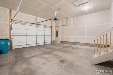 Welcome to this beautiful 3-bedroom, 3.5-bath end-unit townhome on Highland Meadows Golf Course in Colorado - for sale on GolfHomes.com, golf home, golf lot