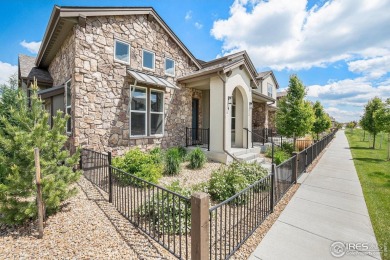 Welcome to this beautiful 3-bedroom, 3.5-bath end-unit townhome on Highland Meadows Golf Course in Colorado - for sale on GolfHomes.com, golf home, golf lot