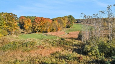 The Estates at Pine Glen is an exclusive residential development on Ravines Golf Club in Michigan - for sale on GolfHomes.com, golf home, golf lot