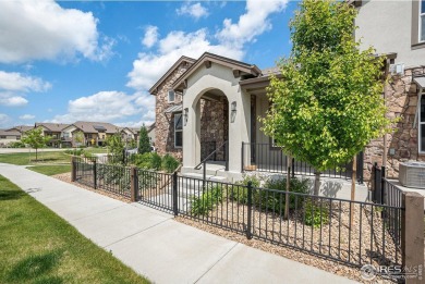 Welcome to this beautiful 3-bedroom, 3.5-bath end-unit townhome on Highland Meadows Golf Course in Colorado - for sale on GolfHomes.com, golf home, golf lot