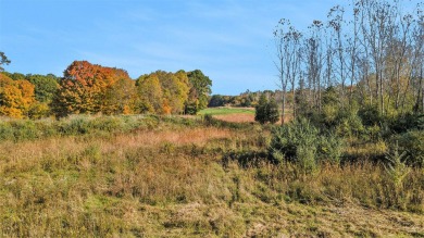 The Estates at Pine Glen is an exclusive residential development on Ravines Golf Club in Michigan - for sale on GolfHomes.com, golf home, golf lot