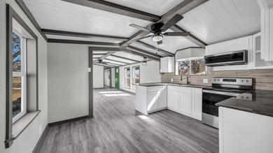 This home has been rehabbed THE RIGHT WAY! Owner has completely on Horseshoe Bend Country Club in Texas - for sale on GolfHomes.com, golf home, golf lot