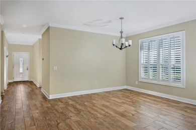 THIS SPACIOUS FOUR-BEDROOM HOME OFFERS OVER 2,700 SQUARE FEET OF on Laurel Island Links in Georgia - for sale on GolfHomes.com, golf home, golf lot