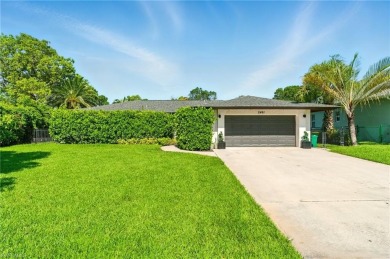 Nestled in an up-and-coming neighborhood backing up to a on Golden Gate Country Club in Florida - for sale on GolfHomes.com, golf home, golf lot
