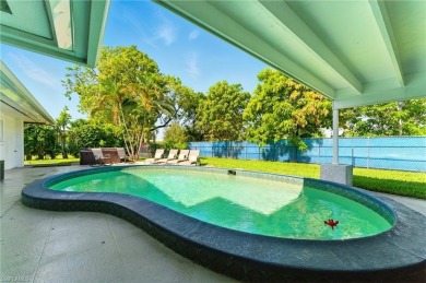Nestled in an up-and-coming neighborhood backing up to a on Golden Gate Country Club in Florida - for sale on GolfHomes.com, golf home, golf lot