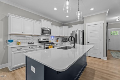 Competitively priced charming ranch style home w/  3 bed/2 bath on River Golf and County Club at Lake Royale in North Carolina - for sale on GolfHomes.com, golf home, golf lot