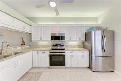 Experience luxurious living with unparalleled views! Step into on Plantation Golf and Country Club in Florida - for sale on GolfHomes.com, golf home, golf lot