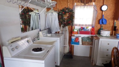 Welcome to this nice and quaint 2-bedroom home, complete with a on Schalamar Creek Golf and Country Club in Florida - for sale on GolfHomes.com, golf home, golf lot