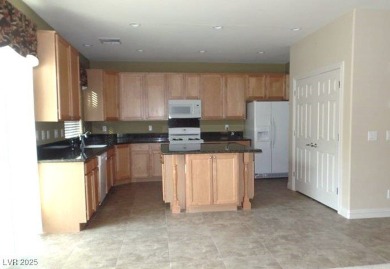 A very popular community with resort-style palm trees, Public on Rhodes Ranch Golf Club in Nevada - for sale on GolfHomes.com, golf home, golf lot