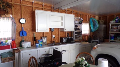 Welcome to this nice and quaint 2-bedroom home, complete with a on Schalamar Creek Golf and Country Club in Florida - for sale on GolfHomes.com, golf home, golf lot