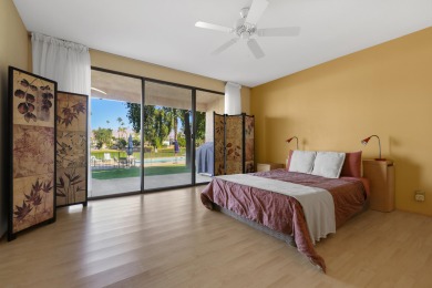 Beautiful Mountain and Pool views from this spacious condo on Bermuda Dunes Country Club in California - for sale on GolfHomes.com, golf home, golf lot