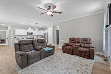 Competitively priced charming ranch style home w/  3 bed/2 bath on River Golf and County Club at Lake Royale in North Carolina - for sale on GolfHomes.com, golf home, golf lot