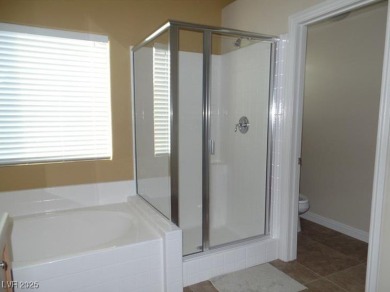 A very popular community with resort-style palm trees, Public on Rhodes Ranch Golf Club in Nevada - for sale on GolfHomes.com, golf home, golf lot