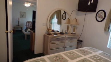 Welcome to this nice and quaint 2-bedroom home, complete with a on Schalamar Creek Golf and Country Club in Florida - for sale on GolfHomes.com, golf home, golf lot
