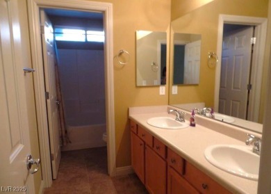 A very popular community with resort-style palm trees, Public on Rhodes Ranch Golf Club in Nevada - for sale on GolfHomes.com, golf home, golf lot