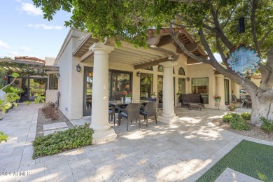 Welcome to this charming single-level home, nestled on the lake on Arizona Biltmore Golf and Country Club in Arizona - for sale on GolfHomes.com, golf home, golf lot