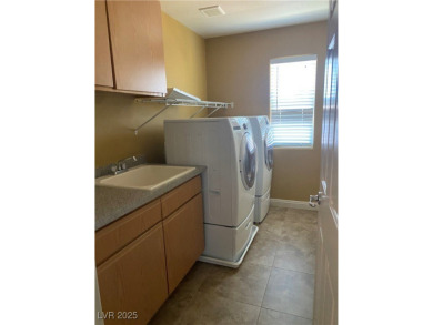 A very popular community with resort-style palm trees, Public on Rhodes Ranch Golf Club in Nevada - for sale on GolfHomes.com, golf home, golf lot