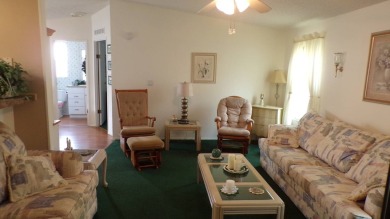Welcome to this nice and quaint 2-bedroom home, complete with a on Schalamar Creek Golf and Country Club in Florida - for sale on GolfHomes.com, golf home, golf lot
