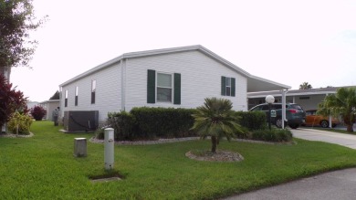 Welcome to this nice and quaint 2-bedroom home, complete with a on Schalamar Creek Golf and Country Club in Florida - for sale on GolfHomes.com, golf home, golf lot