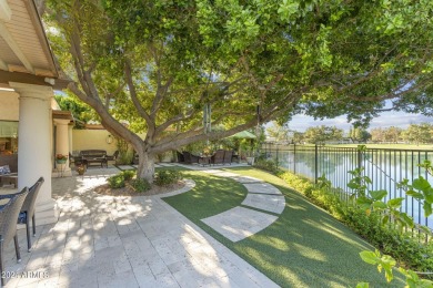 Welcome to this charming single-level home, nestled on the lake on Arizona Biltmore Golf and Country Club in Arizona - for sale on GolfHomes.com, golf home, golf lot