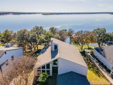 Experience luxury lakeside living in this meticulously updated on De Cordova Bend Country Club in Texas - for sale on GolfHomes.com, golf home, golf lot