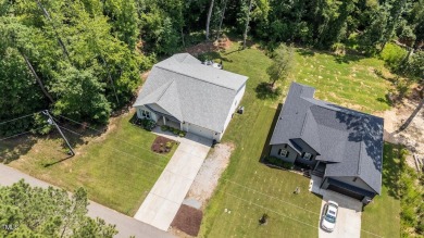 Competitively priced charming ranch style home w/  3 bed/2 bath on River Golf and County Club at Lake Royale in North Carolina - for sale on GolfHomes.com, golf home, golf lot