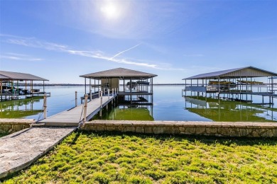 Experience luxury lakeside living in this meticulously updated on De Cordova Bend Country Club in Texas - for sale on GolfHomes.com, golf home, golf lot