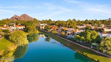 Welcome to this charming single-level home, nestled on the lake on Arizona Biltmore Golf and Country Club in Arizona - for sale on GolfHomes.com, golf home, golf lot