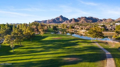 Welcome to this charming single-level home, nestled on the lake on Arizona Biltmore Golf and Country Club in Arizona - for sale on GolfHomes.com, golf home, golf lot