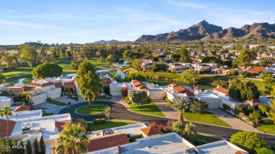 Welcome to this charming single-level home, nestled on the lake on Arizona Biltmore Golf and Country Club in Arizona - for sale on GolfHomes.com, golf home, golf lot